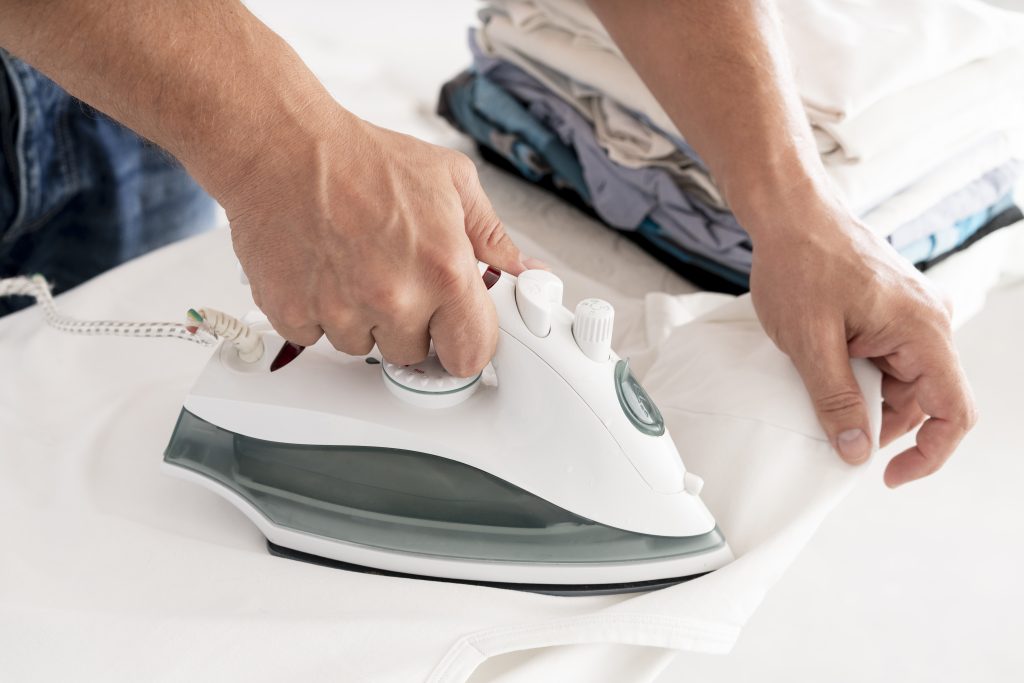 man-ironing-clothes-side-view
